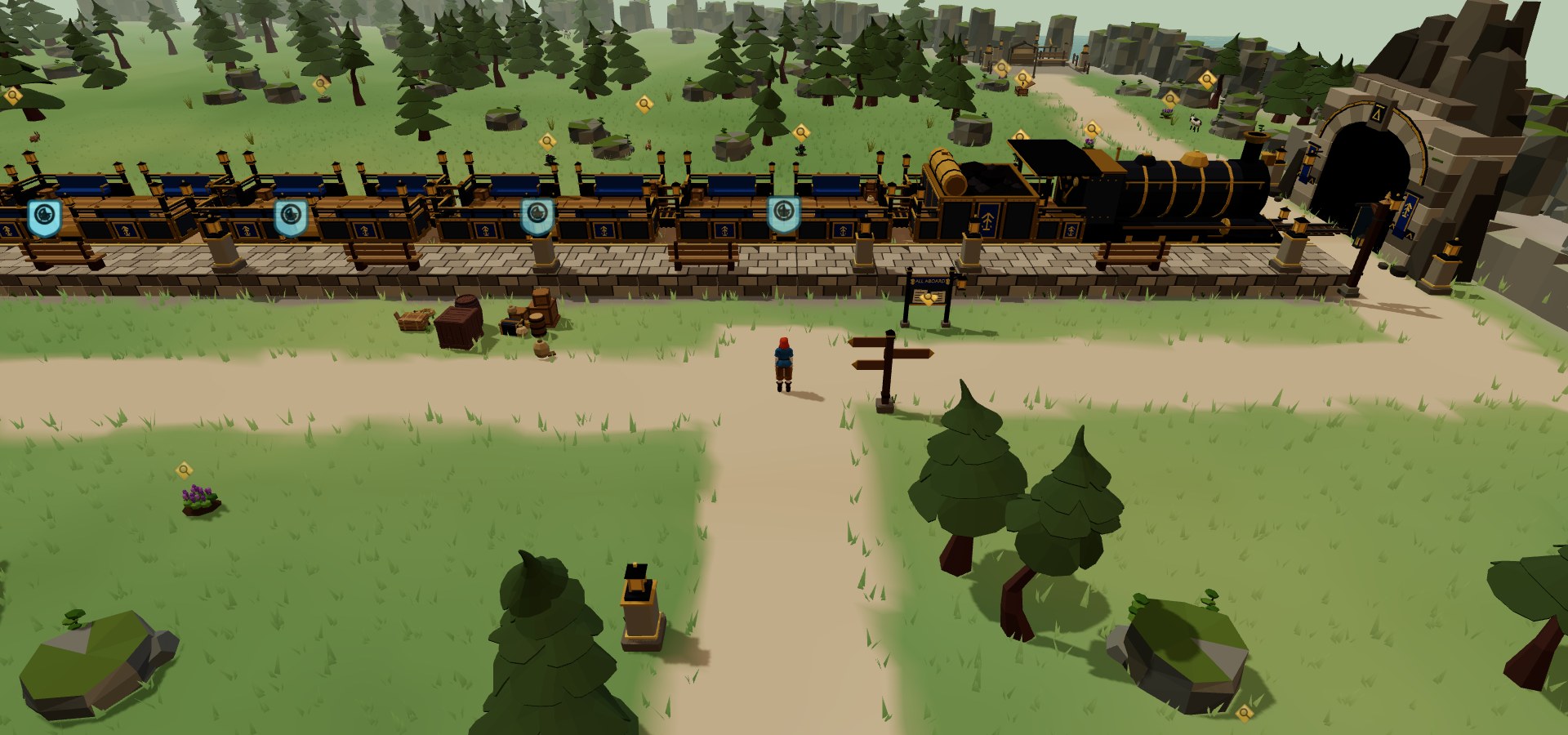 A black and gold steam locomotive and blue carriages wait at the Western Entrance platform beside a tunnel mouth